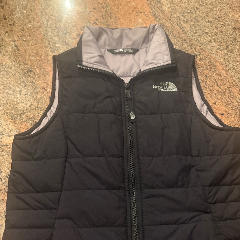 The North Face black and gray puffer vest